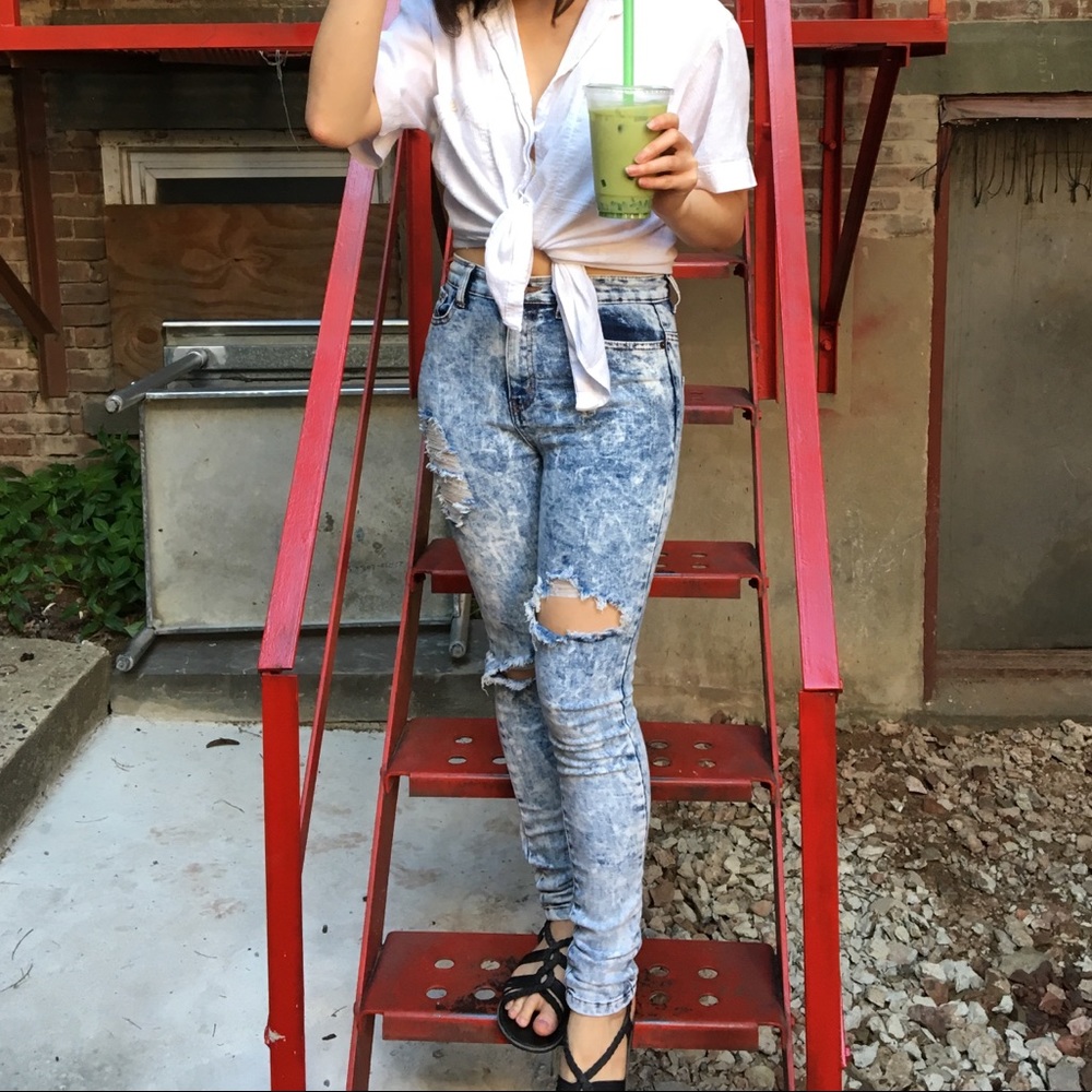 Distressed acid wash high waisted jeans